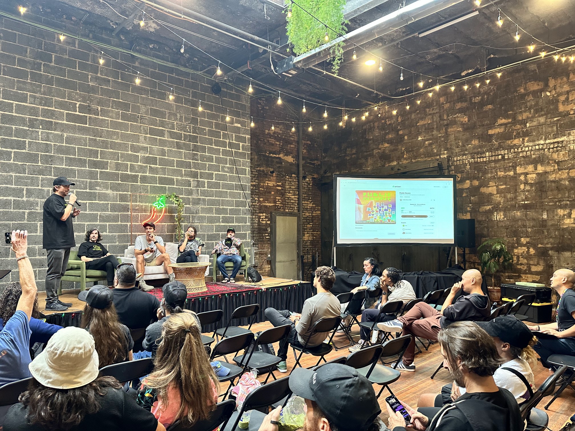 Artizen Summit participants attending a presentation in Detroit