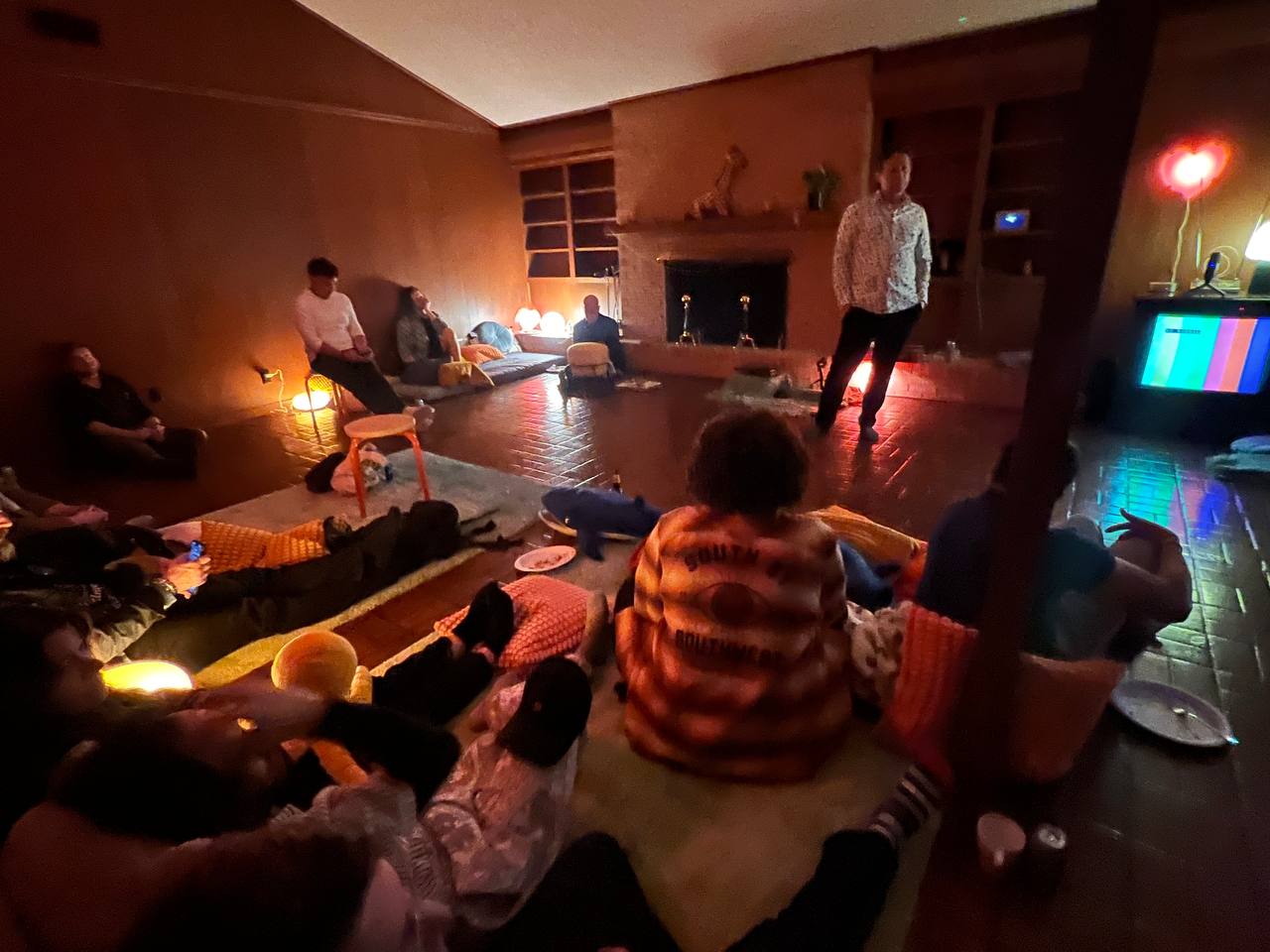 Artizen House guests gathered for a ceremony during SXSW